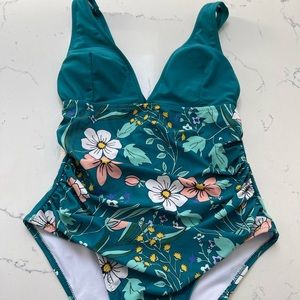 Brand new one piece bathing suit with tag